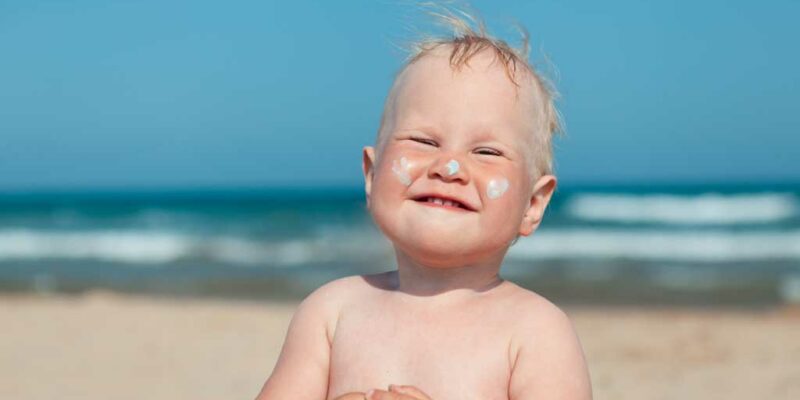 sunscreen baby at beach