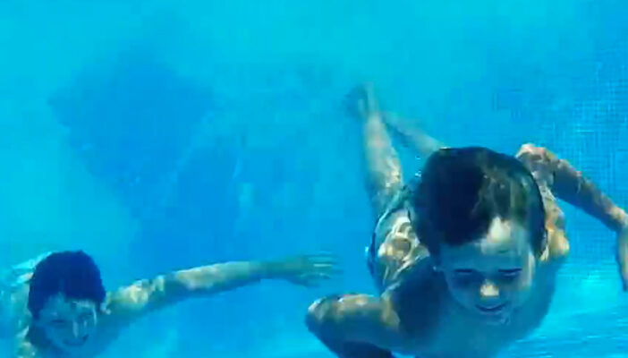 kids swimming in pool