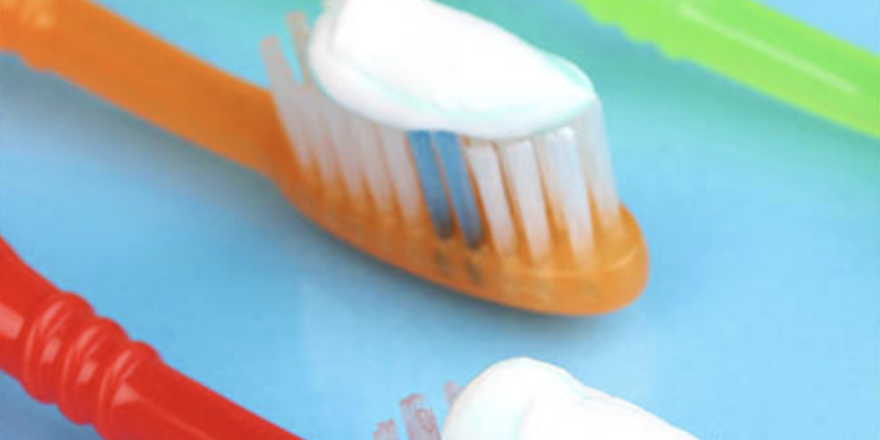 toothpaste on brush