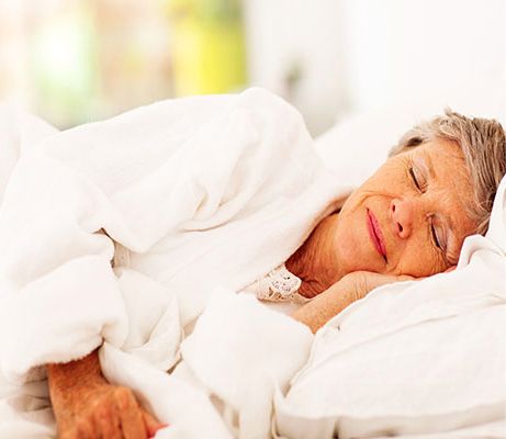 elderly woman taking a nap