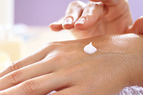 applying hand cream