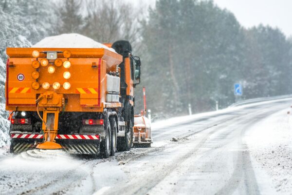 Snow plow clears roads