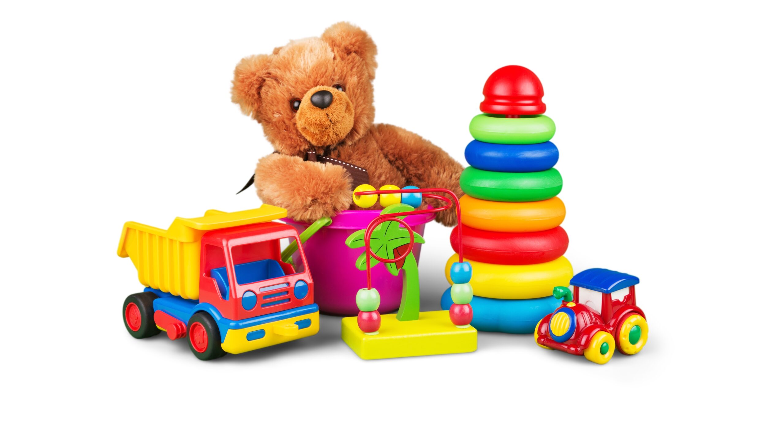 camión de juguete, oso de peluche y otros juguetes para niños