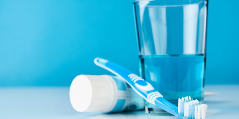 brushing teeth with baking soda